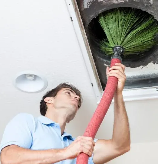 Rotary brush cleaning inside ductwork in a Westside Los Angeles home